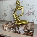 Estatueta Pensativa Dourada